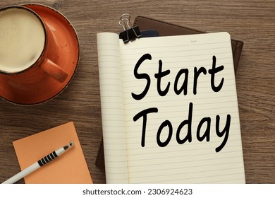 start today open notepad with clip. text on the page. Business, motivational and create future concept. - Shutterstock ID 2306924623