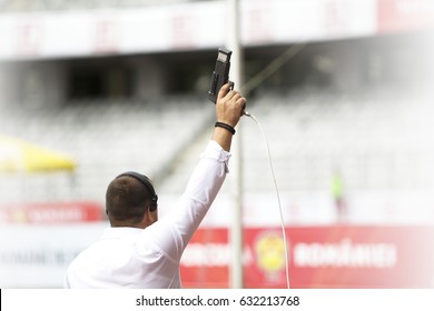 Starter.Hand Firing A Gun For Starting Race
