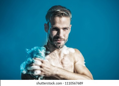 Starting day. Natural athlete showering. Skin care, body care, health care, spa, beauty, people concept - sexy macho, unshaven man, muscular attractive bearded hipster in boxer shorts washes in shower