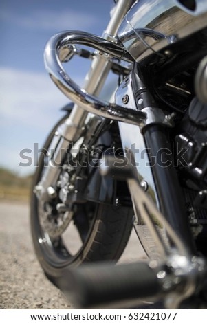 Image, Stock Photo Black motorcycle on road over nature background