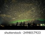 startrails and with northern lights, Canmore, Alberta, Canada