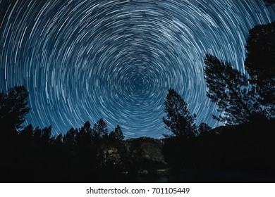 Startrails shot over night sky in Alto Tajo - Shutterstock ID 701105449
