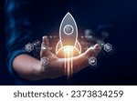 Startup business concept, rocket is launching and flying from hand to sky for growing business, fast business success. startup founder, network connection, idea generation, digital marketing