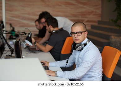 startup business, software developer working on computer at modern office