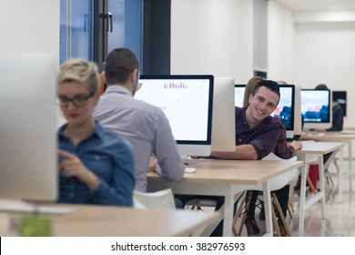 startup business, software developer working on desktop  computer at modern office - Shutterstock ID 382976593
