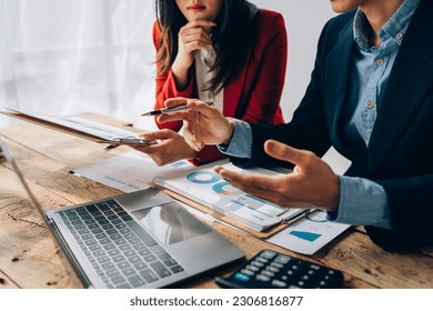 startup business, business team planning teamwork paperwork audit and discussing marketing, profit, budget of company in meeting room - Powered by Shutterstock