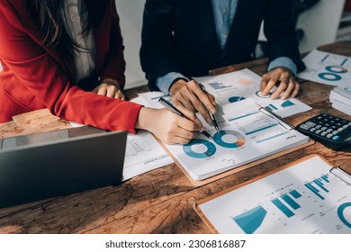 startup business, business team planning teamwork paperwork audit and discussing marketing, profit, budget of company in meeting room - Powered by Shutterstock