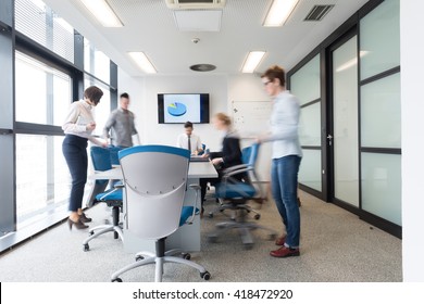 Startup Business, Young Creative  People Group Entering Meeting Room,  Modern Office Interior And Motion Blur