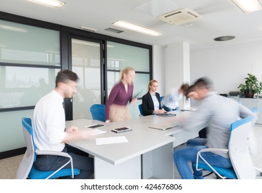 Startup Business, Young Creative  People Group Entering Meeting Room,  Modern Office Interior And Motion Blur