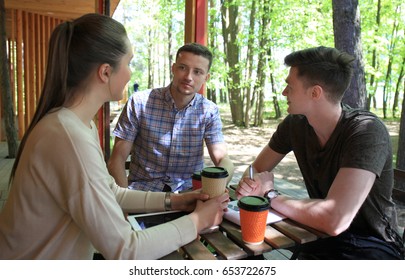 Startup Business, Young Creative People Group Brainstorming On Meeting Outside The Office.