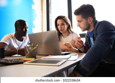 Startup Diversity Teamwork Brainstorming Meeting Concept.Business Team. People Working Planning Start Up.Group Young Hipsters Discussing Cafe - Shutterstock ID 1022538634