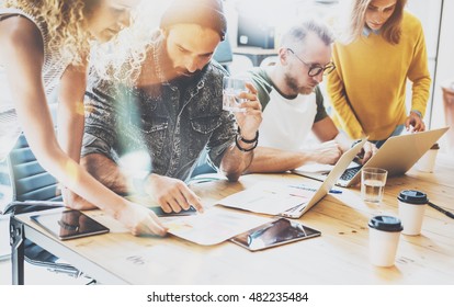 Startup Diversity Teamwork Brainstorming Meeting Concept.Business Team Coworkers Sharing World Economy Report Document Laptop.People Working Planning Start Up.Group Young Hipsters Discussing Cafe - Shutterstock ID 482235484