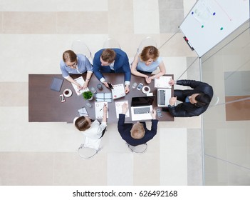 Startup Diversity Teamwork Brainstorming Meeting Concept. Business Young Multiethnic Team Working And Planning Start Up In Modern Office. Top View