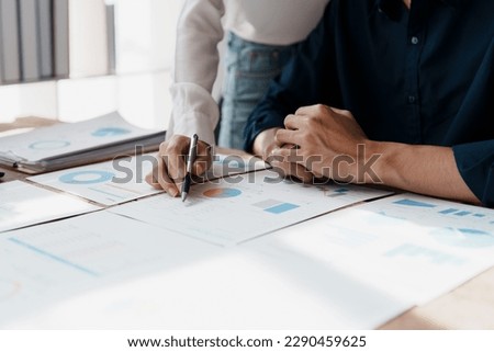 Startup family business, husband and wife discussing financial affairs, investing, making profit, tax deduction from trading using computer and investment budget paperwork working.