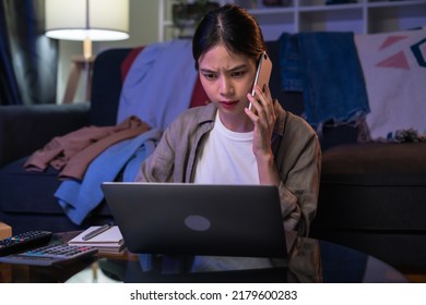 Startup small business concept, young woman owner working and calling to customer at home office, seller prepares the delivery.