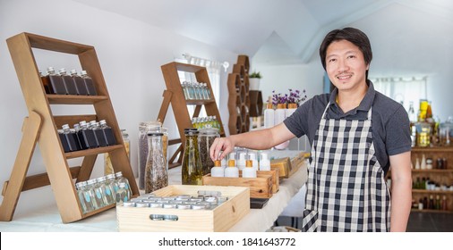 Startup successful Asia sme small business entrepreneur owner job, asian man standing in handmade organic oil spa soap shop. Portrait of asian man successful seller owner environment friendly concept