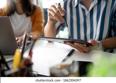 Startup team meeting in modern workplace with project ideas. - Shutterstock ID 1862304397