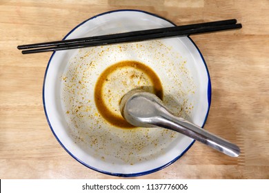 I'm Starving Just Eat It All Noodles With Thick Spicy Soup In Unwashed Rusty Zinc Bowl On Wood Table, Top View,Copy Space.