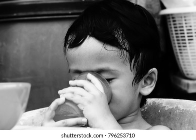 Starving Street Kids Eating Noodles In Black And White Colour Tone