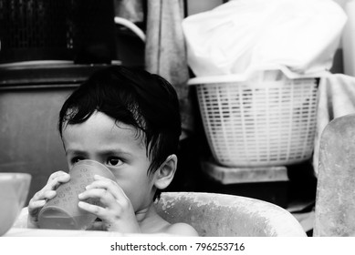 Starving Street Kids Eating Noodles In Black And White Colour Tone