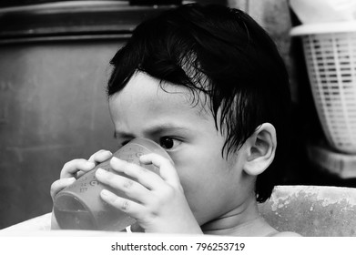 Starving Street Kids Eating Noodles In Black And White Colour Tone