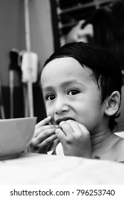 Starving Street Kids Eating Noodles In Black And White Colour Tone