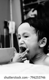 Starving Street Kids Eating Noodles In Black And White Colour Tone