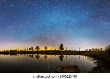 Stary night at the lake - Shutterstock ID 1490223440