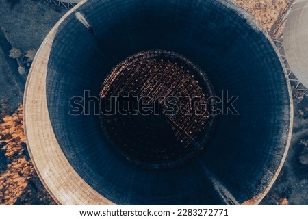 State District Power Station. Collapsed Cooling tower. Aerial landscape view of the cooling towers of a Coal Fired Power Station. Willington Power Station. UK. Aerial. Drone. 