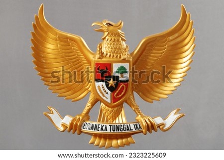 State emblem of Indonesia is called Garuda Pancasila, the national motto: 