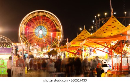 State Fair Carnival Midway Games Rides Ferris Wheel - Shutterstock ID 650517433