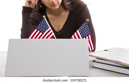 State Or Federal Female Worker With A Blank Sign On Her Desk