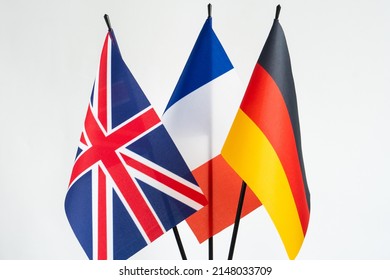 State Flags Of United Kingdom, Germany And France On White Background. Europe Cooperation Concept