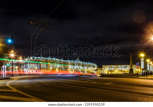 The State
Hermitage Museum at night lights against background of traces
headlights of passing cars,
Saint-Petersburg