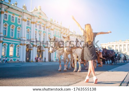 The State Hermitage Museum, one of the largest and historical museums in Russia and the world. Little girl enjoy vacation in Saint Petersburg