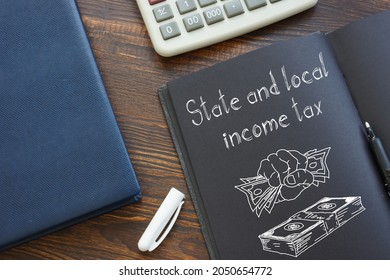 State And Local Income Tax Is Shown On A Business Photo Using The Text