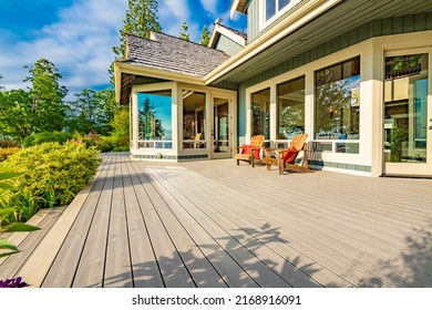Stately waterfront home in pacific northwest with ocean views expansive decks hot tub front porch and long paved driveway - Shutterstock ID 2168916091
