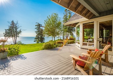 Stately waterfront home in pacific northwest with ocean views expansive decks hot tub front porch and long paved driveway - Shutterstock ID 2168916101
