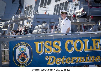 STATEN ISLAND, NY - MAY 25, 2014: A U.S. Navy Officer Walks Down The Metal Gangplank Of The Guided-missile Destroyer USS Cole (DDG 067) Moored At Sullivans Piers For Fleet Week NY.