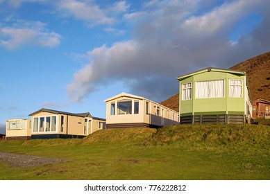 Static Caravan Holiday Homes At Llangennith On The Gower Peninsular In Winter Which Is Out Of Season, The Caravans Are Closed Up Until Spring And The Park Is Empty Of People. 