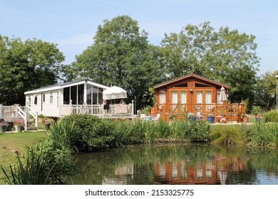 Static caravans and lodges on holiday parks - Shutterstock ID 2153325775