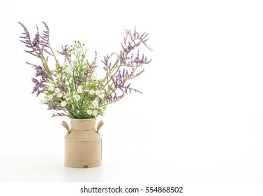 statice and caspia flower in vase on the table - Shutterstock ID 554868502