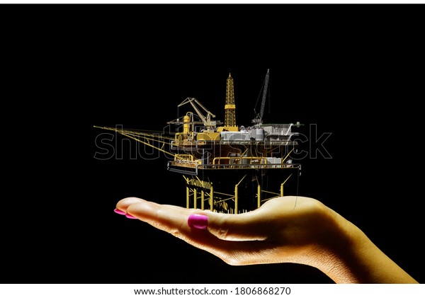 Station for oil\
production in human\
hands.