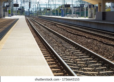 Station platform and railway tracks
