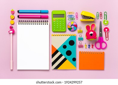 Stationary, Back To School, Summer Time, Creativity And Education Concept School Supplies - Dividers, Pencils, Paper Clips, Note, Stapler, Notepad, Globe On Pink Background, Flatlay Mock Up Top View