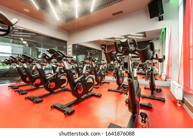 Stationary Bicycles. Indoor Cycling For Lifestyle Design. Fitness Background. Class With Empty Bikes. Soft Focus Background.