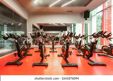 Stationary Bicycles. Indoor Cycling For Lifestyle Design. Fitness Background. Class With Empty Bikes. Soft Focus Background.