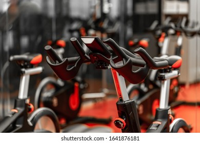 Stationary Bicycles. Indoor Cycling For Lifestyle Design. Fitness Background. Class With Empty Bikes. Soft Focus Background.