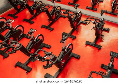 Stationary Bicycles. Indoor Cycling For Lifestyle Design. Fitness Background. Class With Empty Bikes. Soft Focus Background.