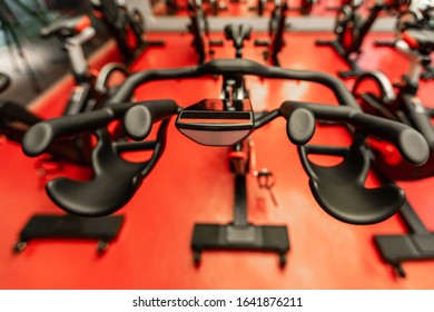 Stationary Bicycles. Indoor Cycling For Lifestyle Design. Fitness Background. Class With Empty Bikes. Soft Focus Background.